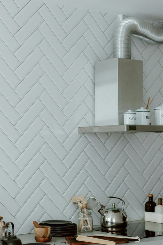Semi rigid duct connected to range hood in an organized kitchen